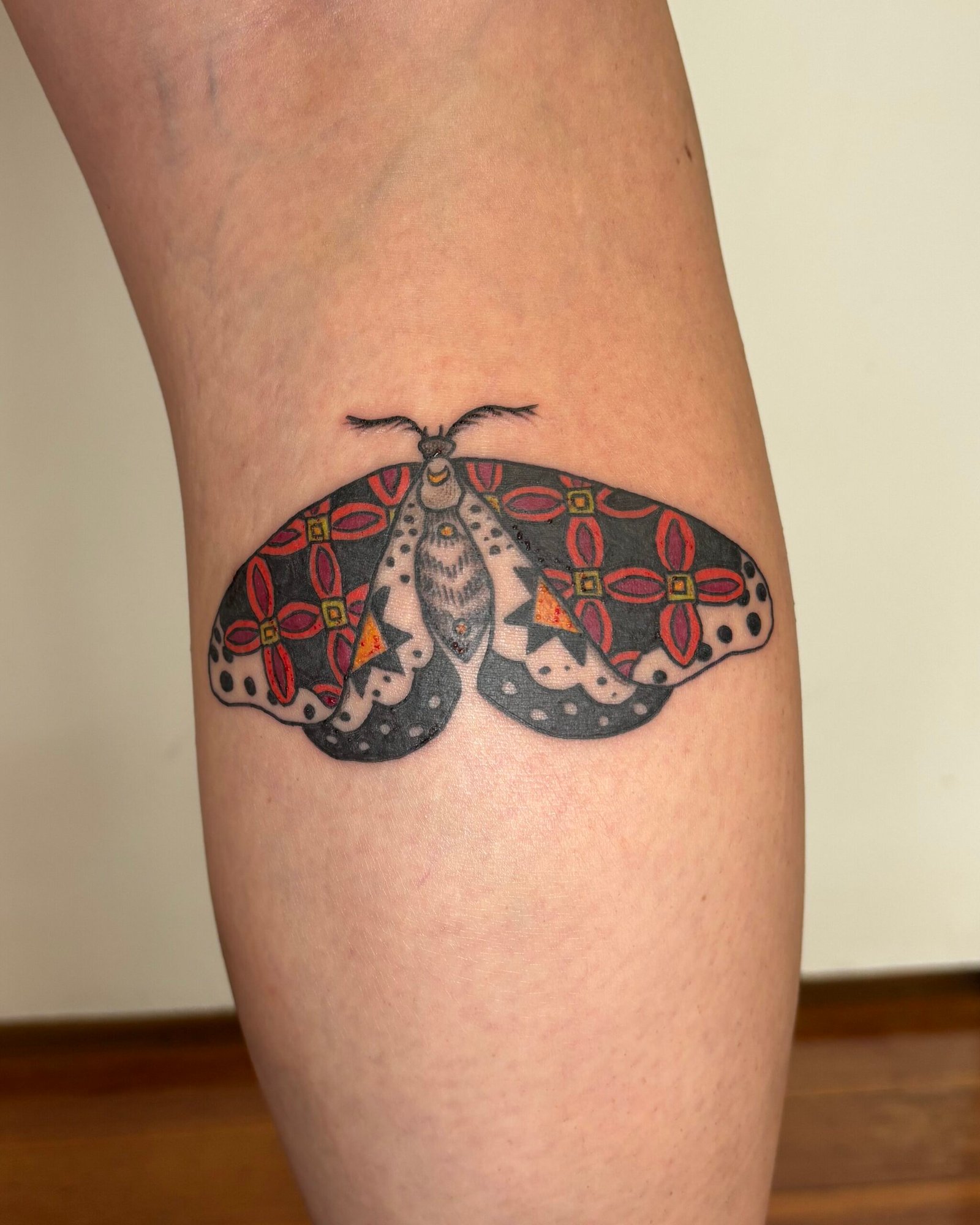 Quilt Butterfly Tattoo in Manchester CT at Wildwood Tattoos by Shannon Starvish. Color tattoo, women tattoo artist.